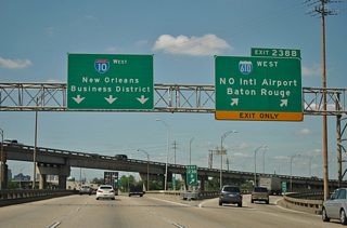 I-10 West heading into New Orleans Business District, with signs for MSY Airport and Baton Rouge